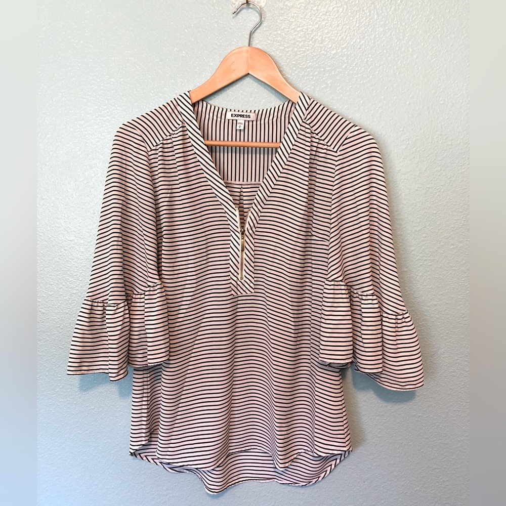 Striped, flared sleeve blouse.